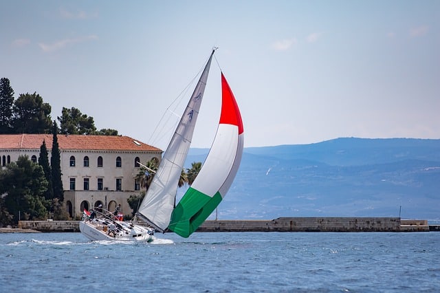 sailboat with hungarian flag sail